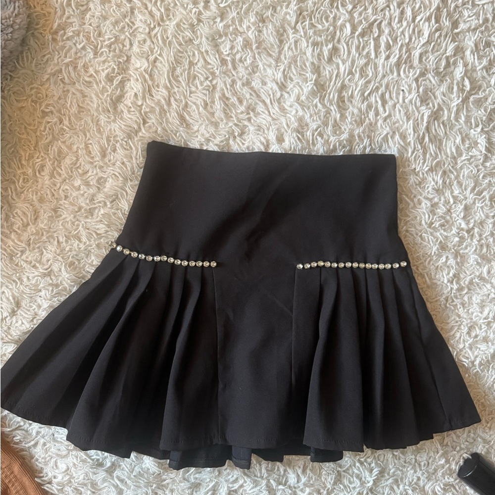 Pleated Black Mini Skirt with Rhinestone Accents